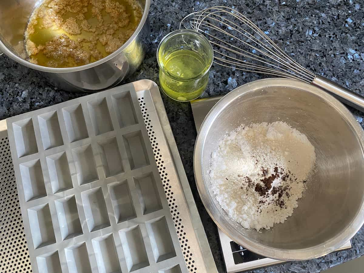 preparing ingredients and cake moulds for baking