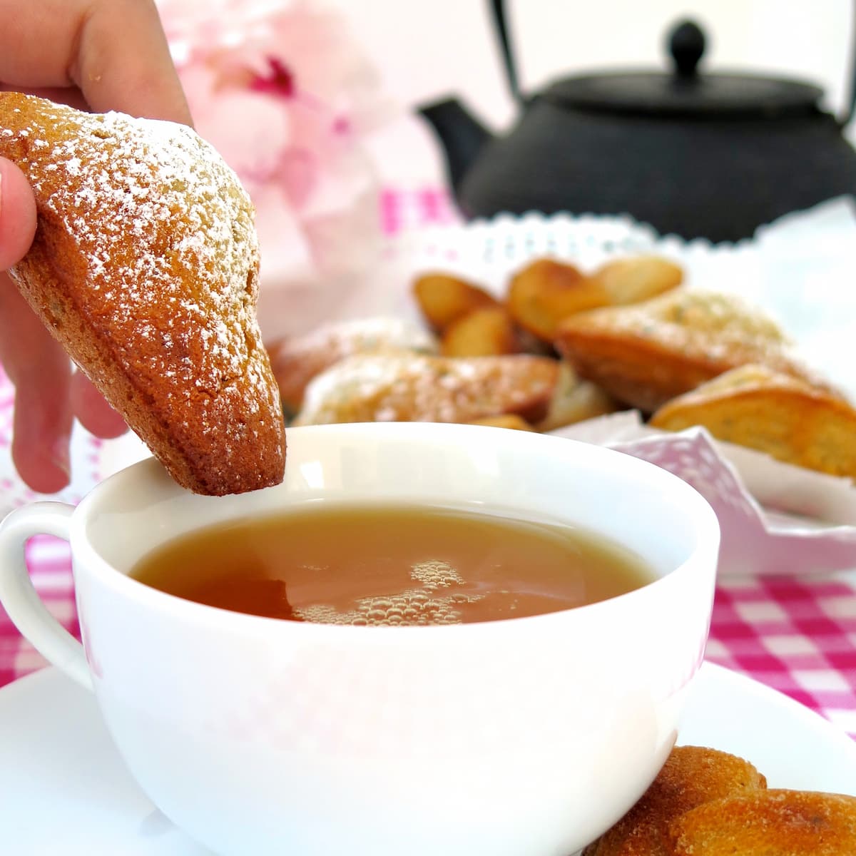 madeleine cake with a cup of tea