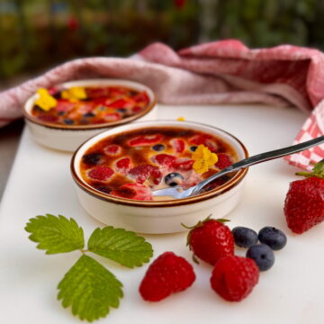 easy berry dessert make with an elderflower cream and toasted like a creme brulee