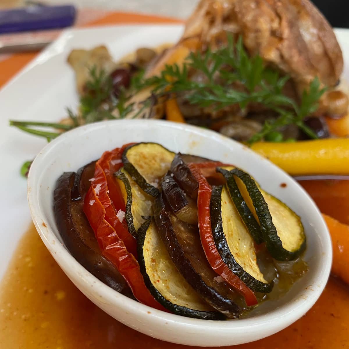 little individual dish of roasted sliced vegetables