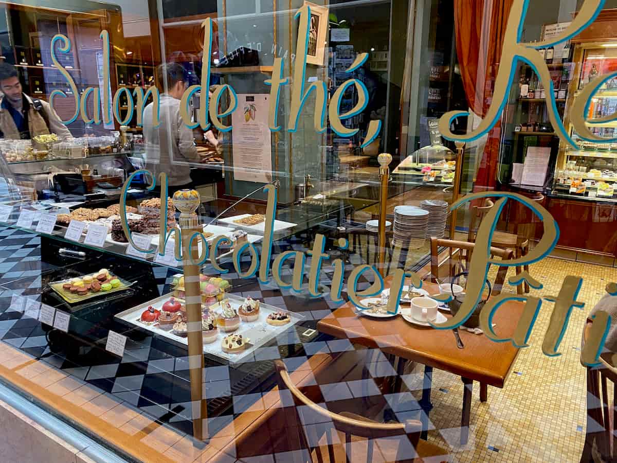 French tea salon window with cakes inside