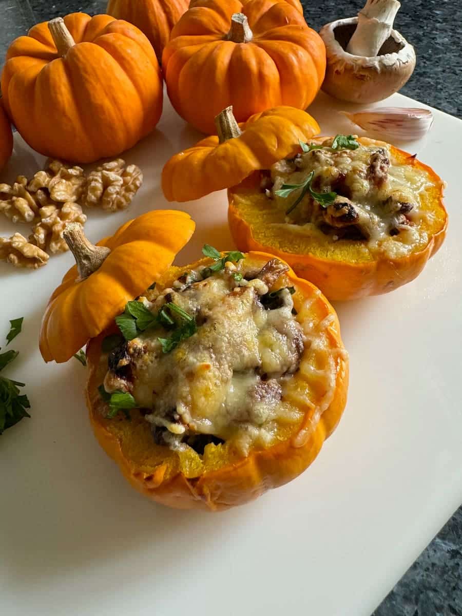 Mini pumpkins stuffed with mushrooms and cheese