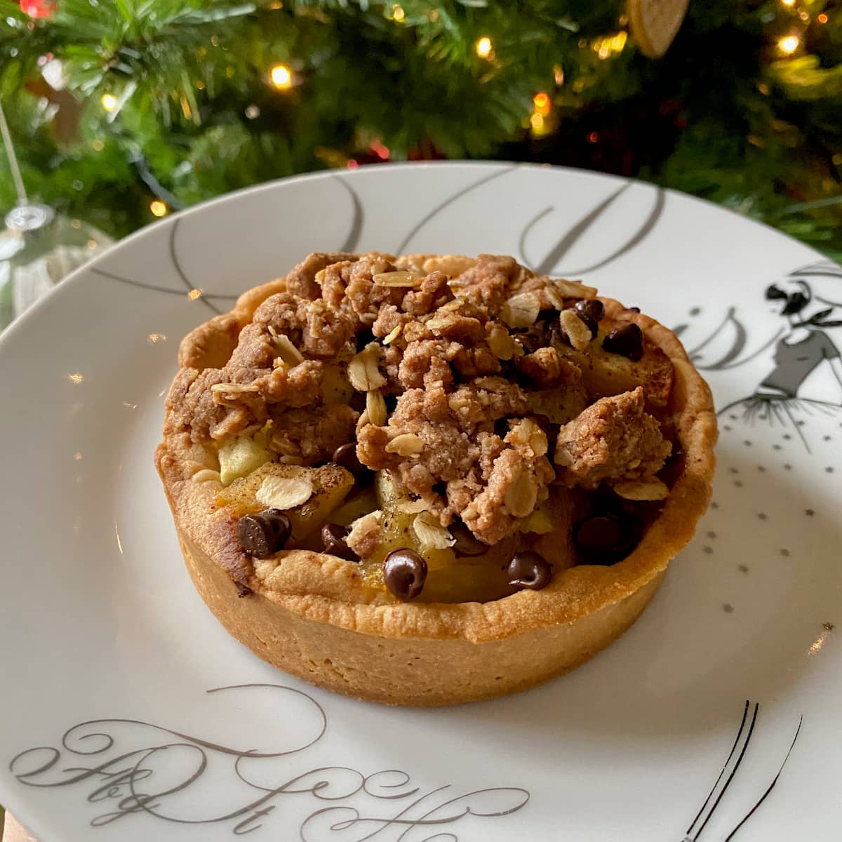 apple tartlet topped with chocolate crumble