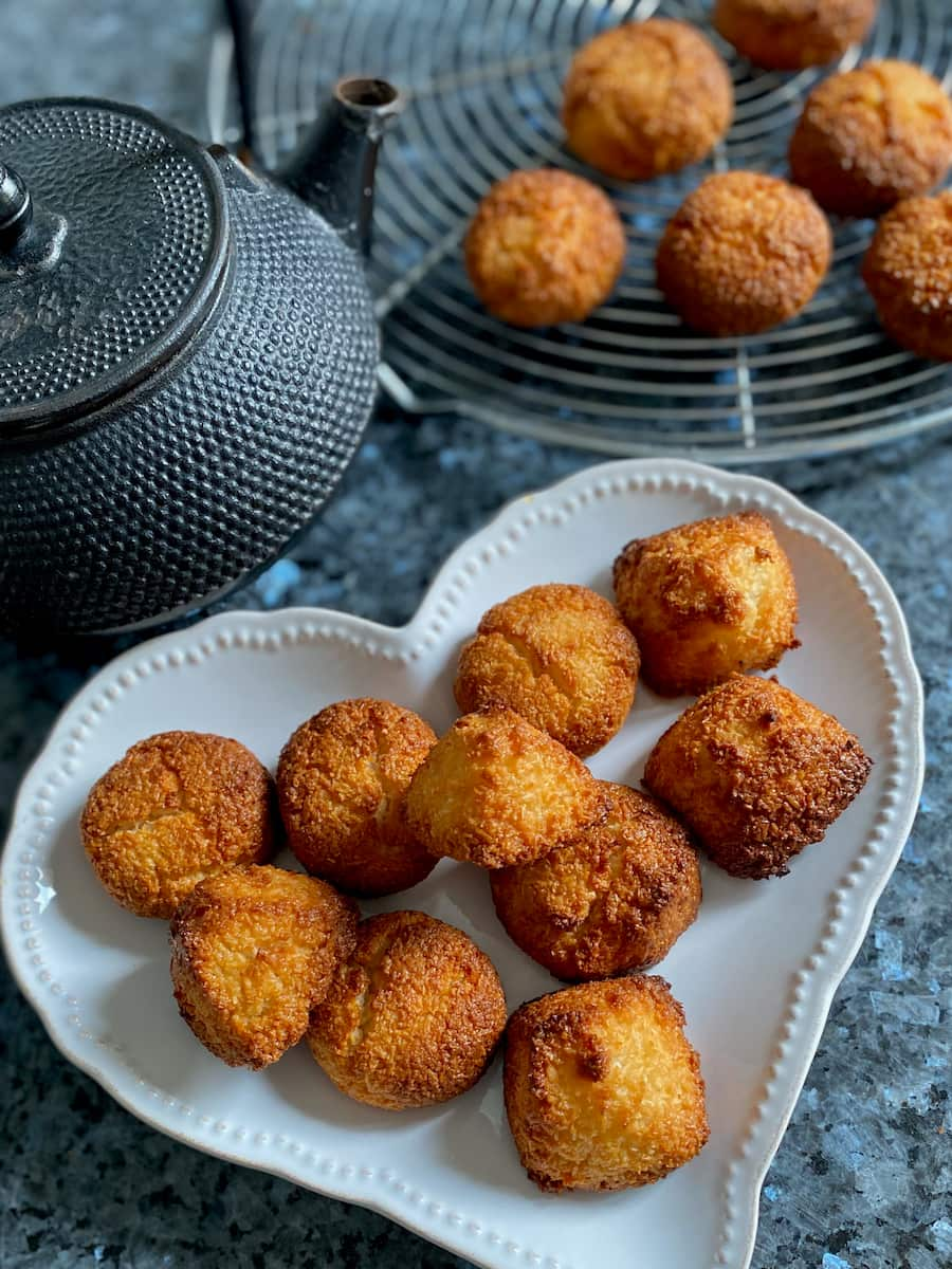 plate of coconut cookies with tea