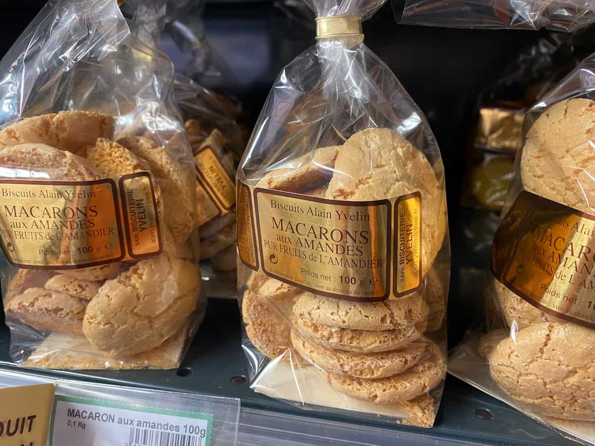 packets of cracked almond macaron biscuits on a shelf