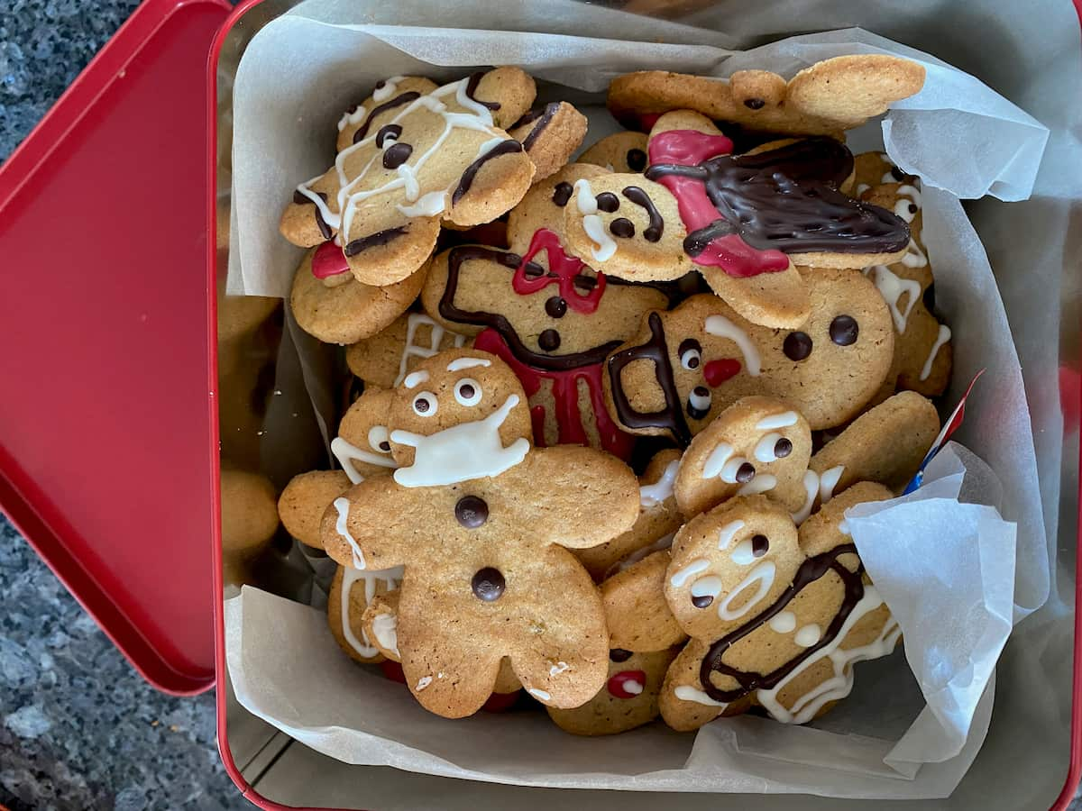 tin of decorated cookies