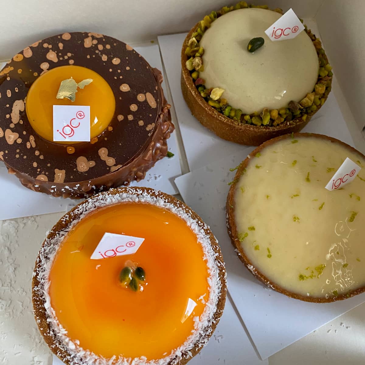 4 tarts in a pastry box