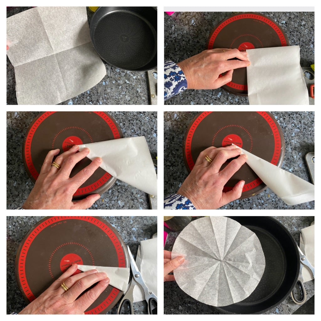 step by step folding over baking paper from the centre of a cake tin to line it