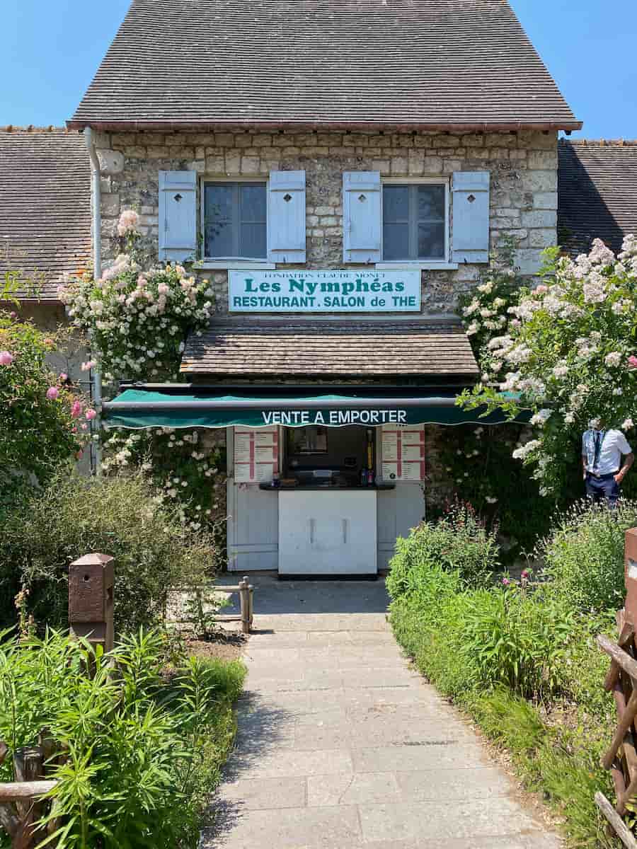 pretty rose covered restaurant in front of Monet's house in Giverny