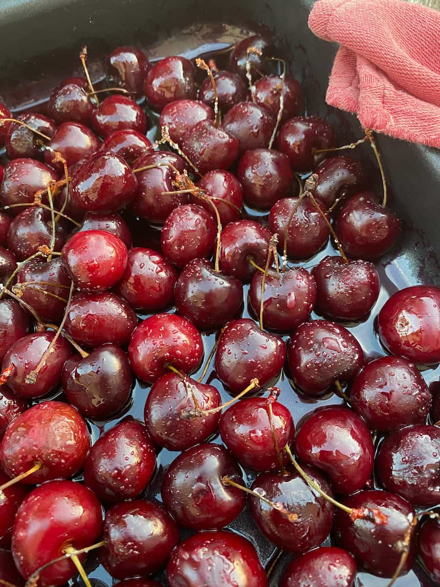 roasting tin of roasted cherries