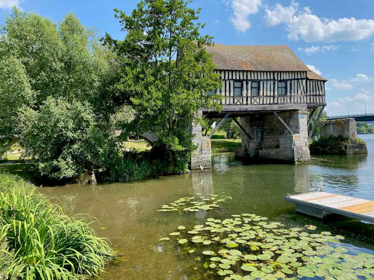 old timbered house on stilts over the river in Vernon, near Giverny