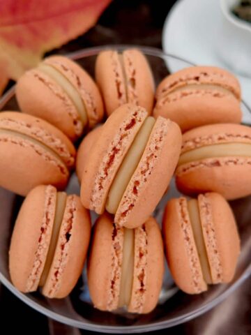 close up of caramel macarons with a thick filling