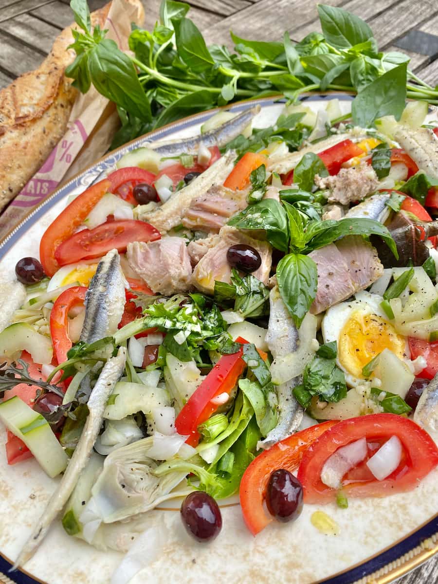 composed plate of a colourful French Niçoise salad