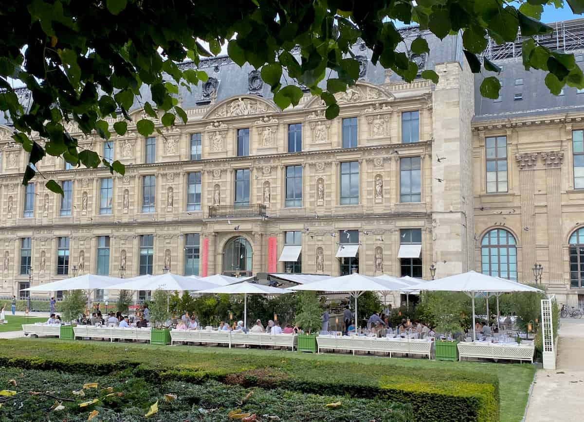 Paris decorative art museum with outdoor restaurant in front in gardens