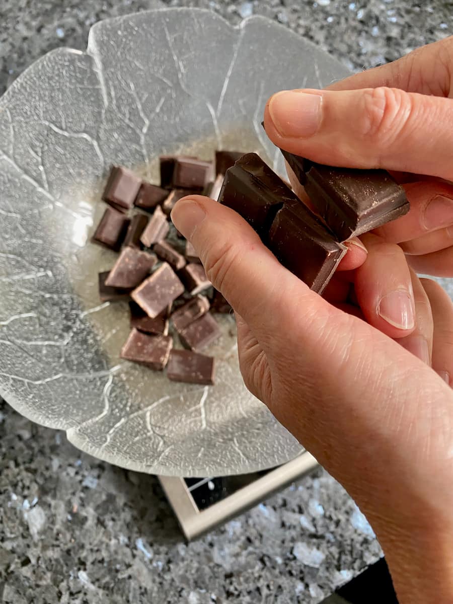 breaking up best quality chocolate for baking