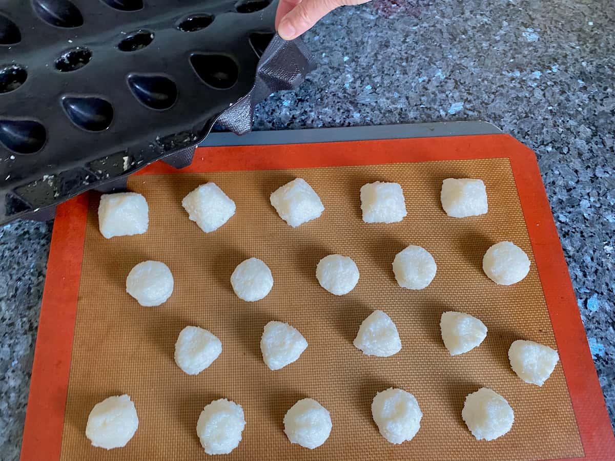 coconut macaroons shaped in rounds using hands or in moulds like the French way