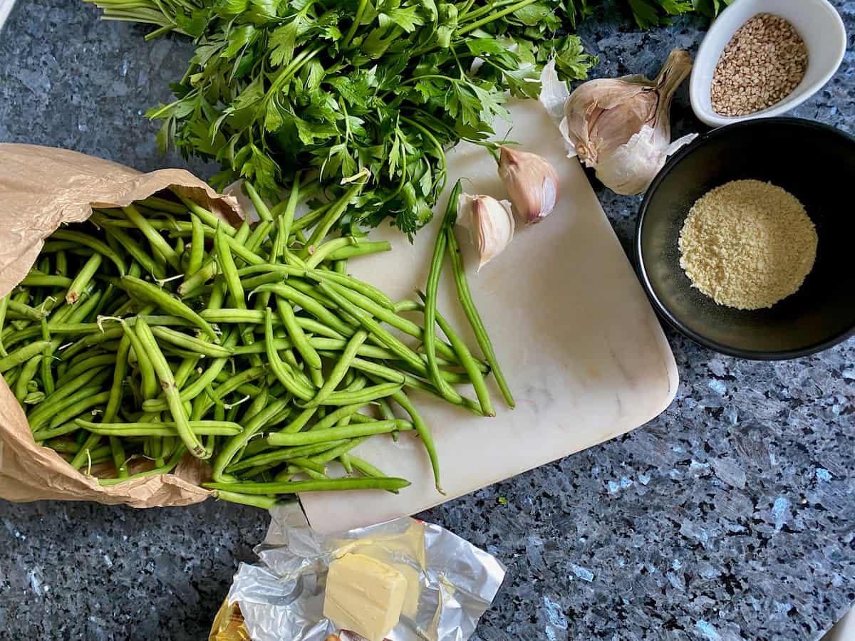 fresh green beans ready to prepare to make a French side dish