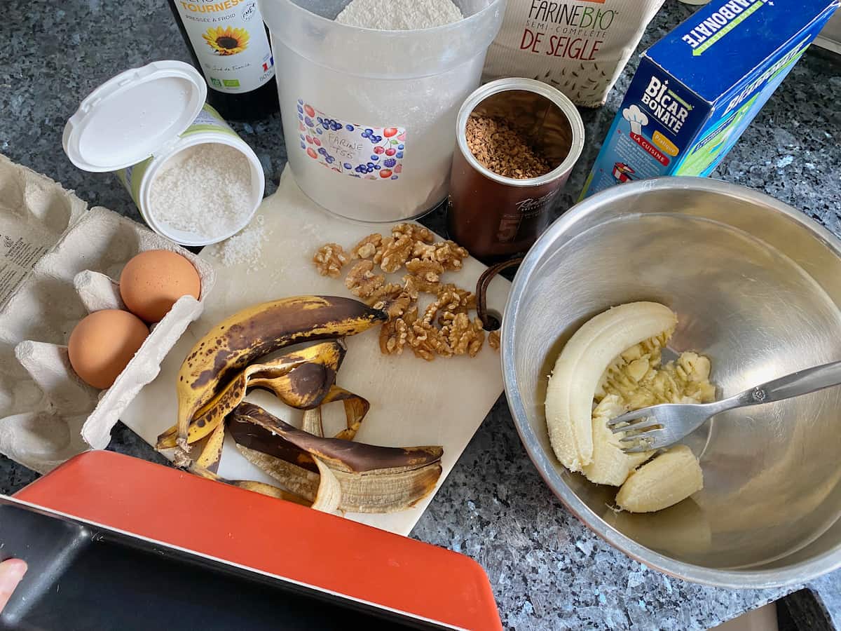 mashing up old bananas, perfectly ripe to make a cake