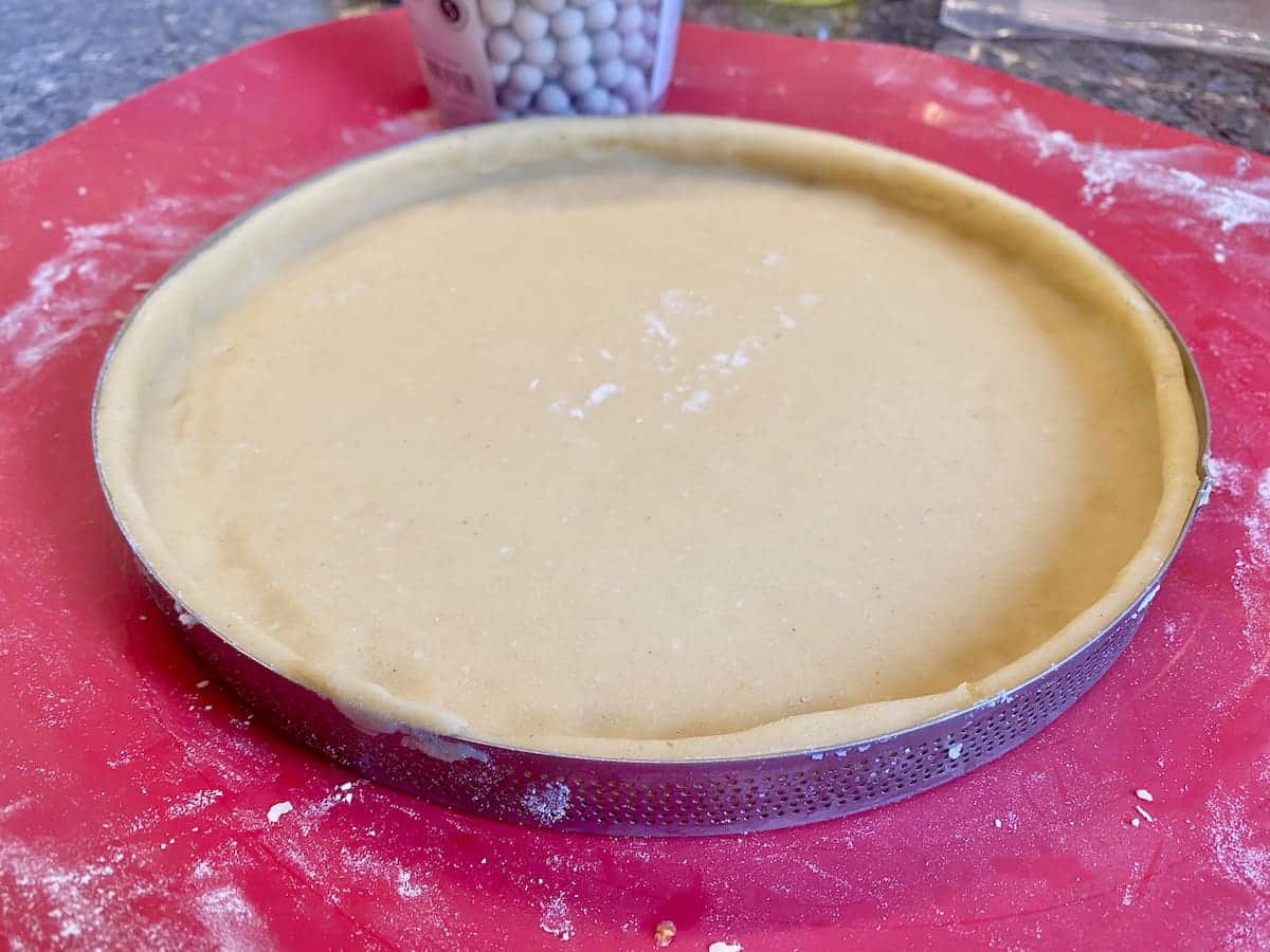 smooth, pâte sucrée sweet tart pastry ready to go in the oven