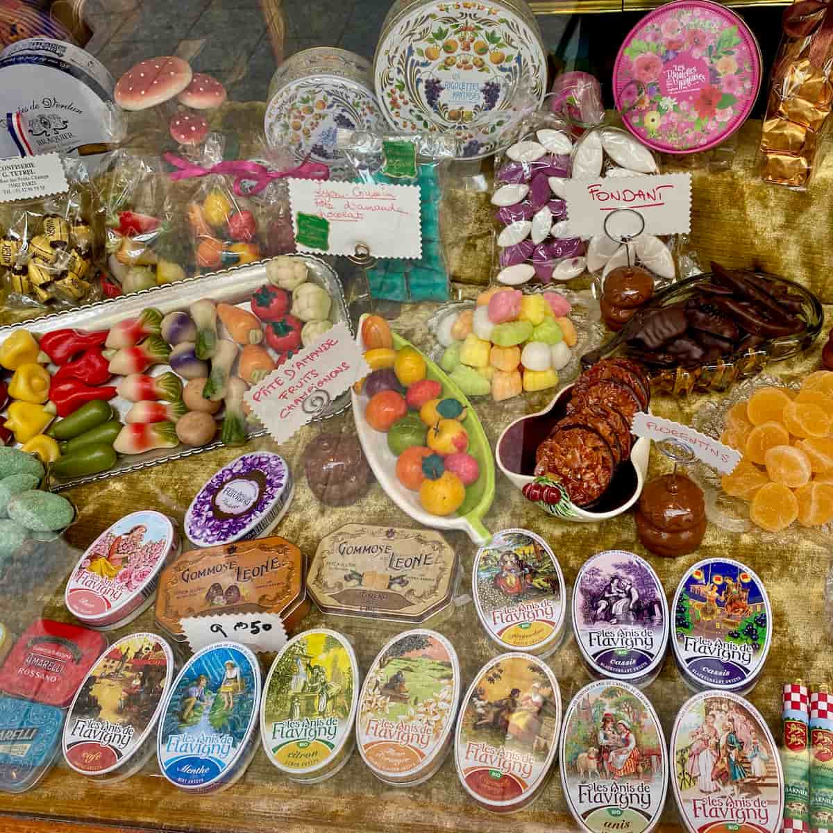 Parisian shop window packed with different artisanal candies