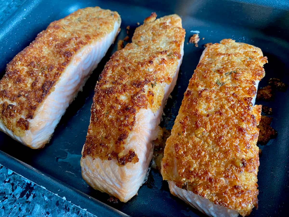 crispy topped salmon fillets out of the oven