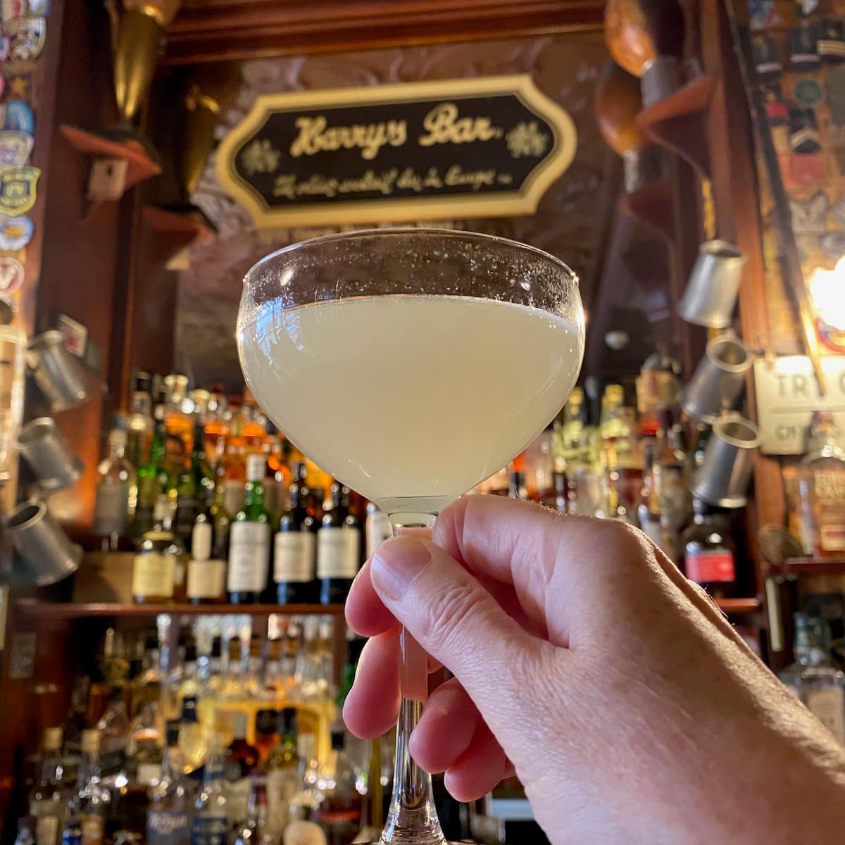 Champagne glass with a lemon cocktail at Harry's Bar Paris