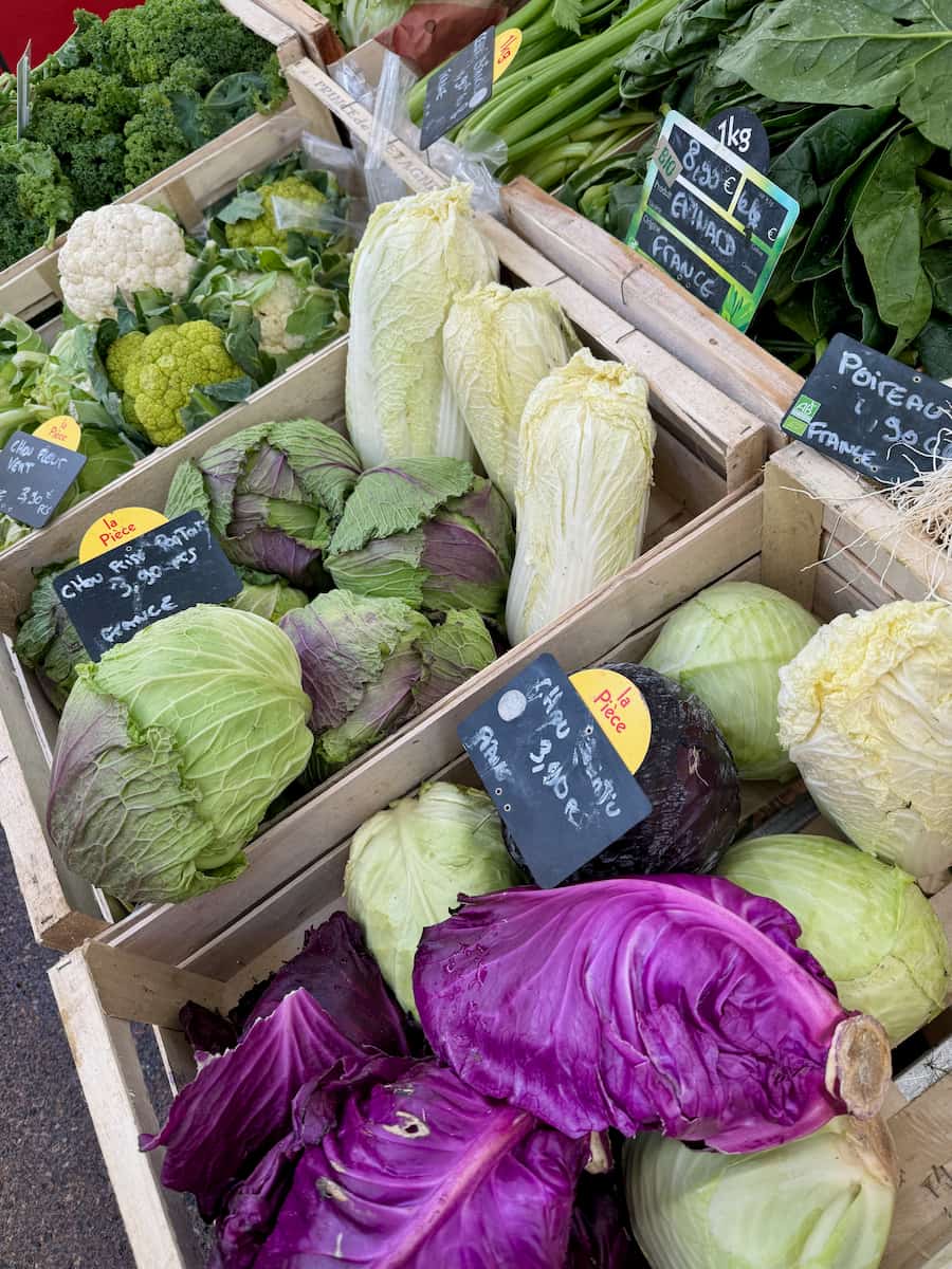 various varieties of French cabbages at the market