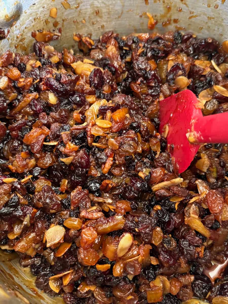 stirring up mincemeat without suet - a mixture of dried fruits, nuts and Brandy