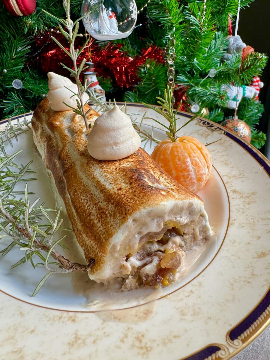 chestnut ice cream log topped with toasted French meringue, rosemary and meringue trees