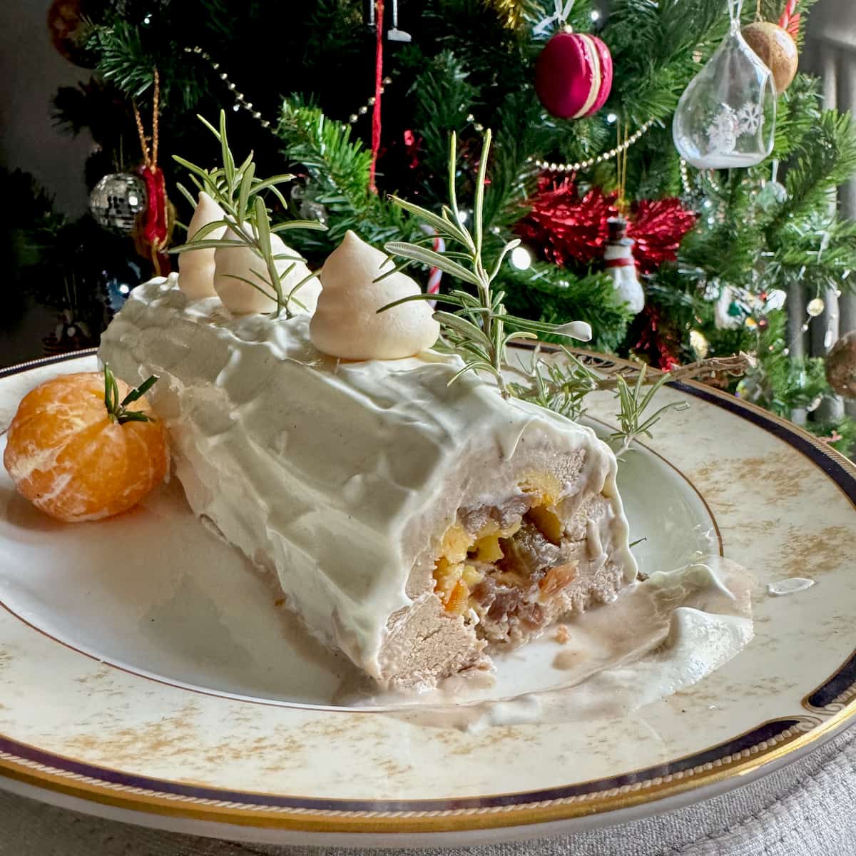 ice cream log filled with candied chestnuts and orange and topped with meringue