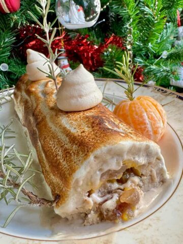 chestnut ice cream log filled with candied chestnuts, orange and topped with toasted meringue