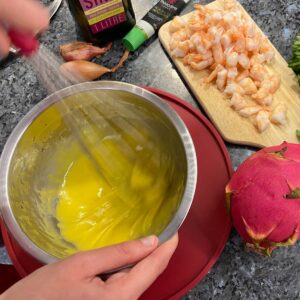 whisking up a homemade mayonnaise with wasabi paste
