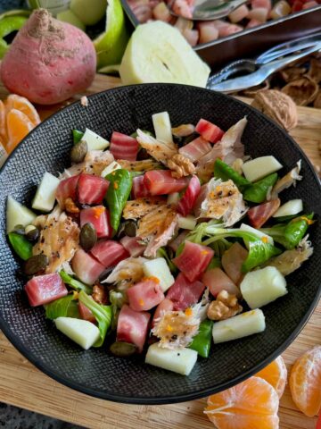 beetroot salad with apple, leaves, nuts, seeds, orange and smoked mackerel