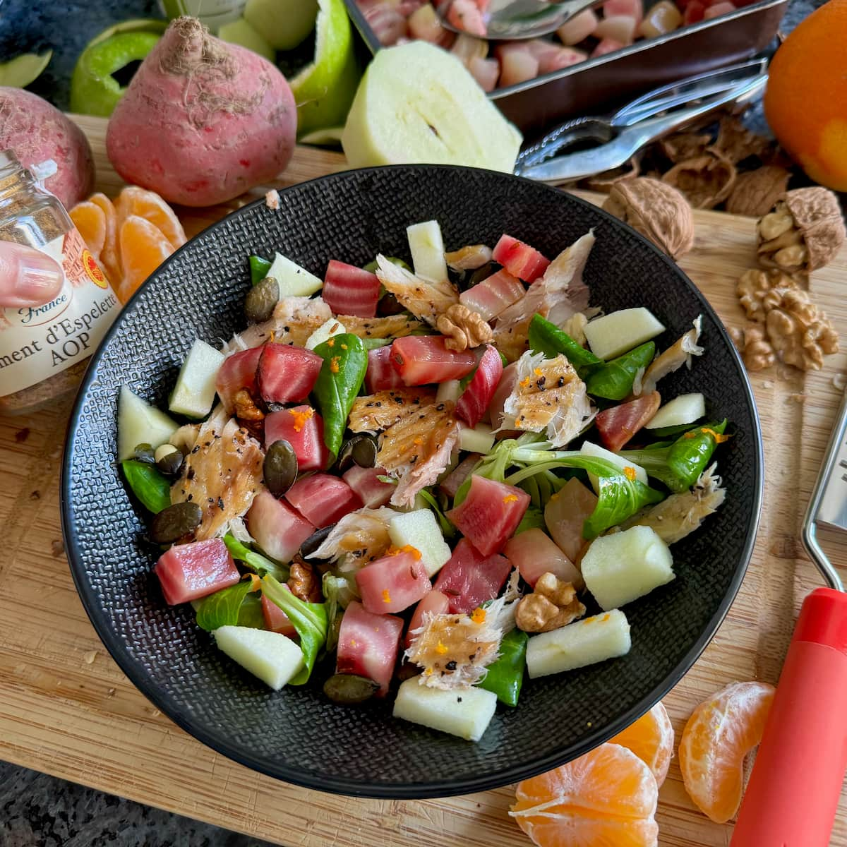 beetroot salad with apple, leaves, nuts, seeds, orange and smoked mackerel