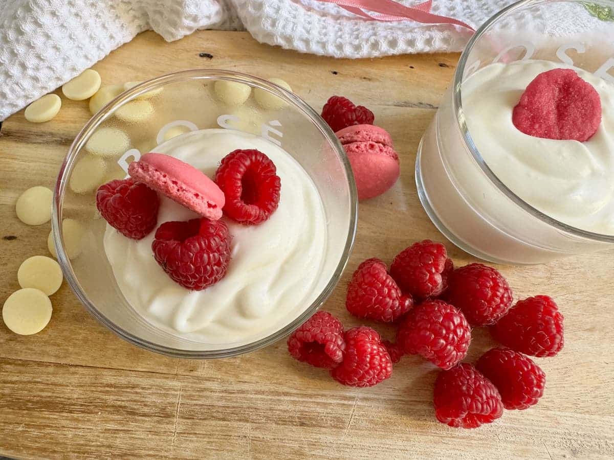 top mousse with raspberries and rose macarons