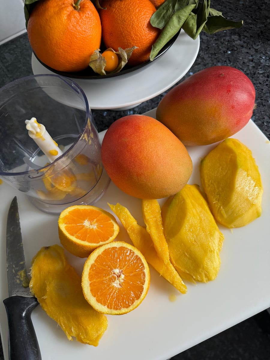 vibrant yellow-orange sweet mango with an orange