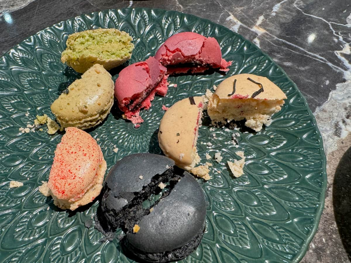 plate of halved macarons showing a dry interior