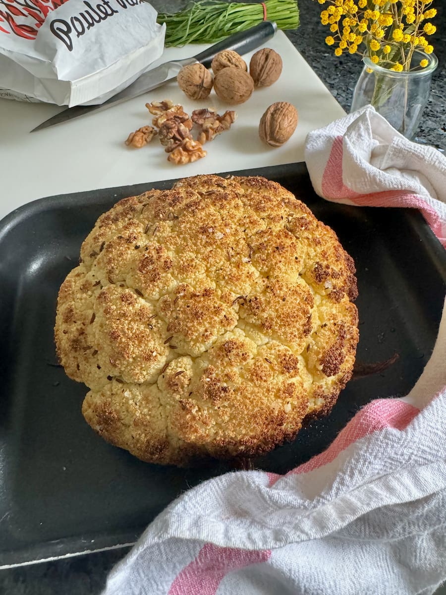 whole roasted head of cauliflower out of the oven