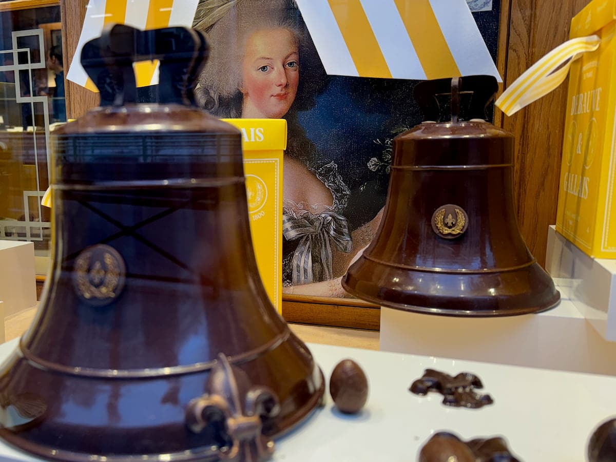 large dark chocolate bells with a portrait of Queen Marie-Antoinette