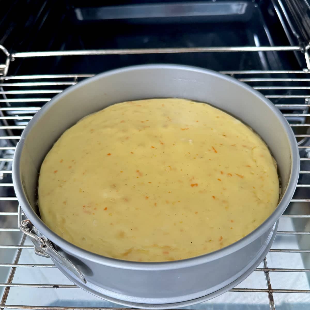 cheesecake cooling out of the oven