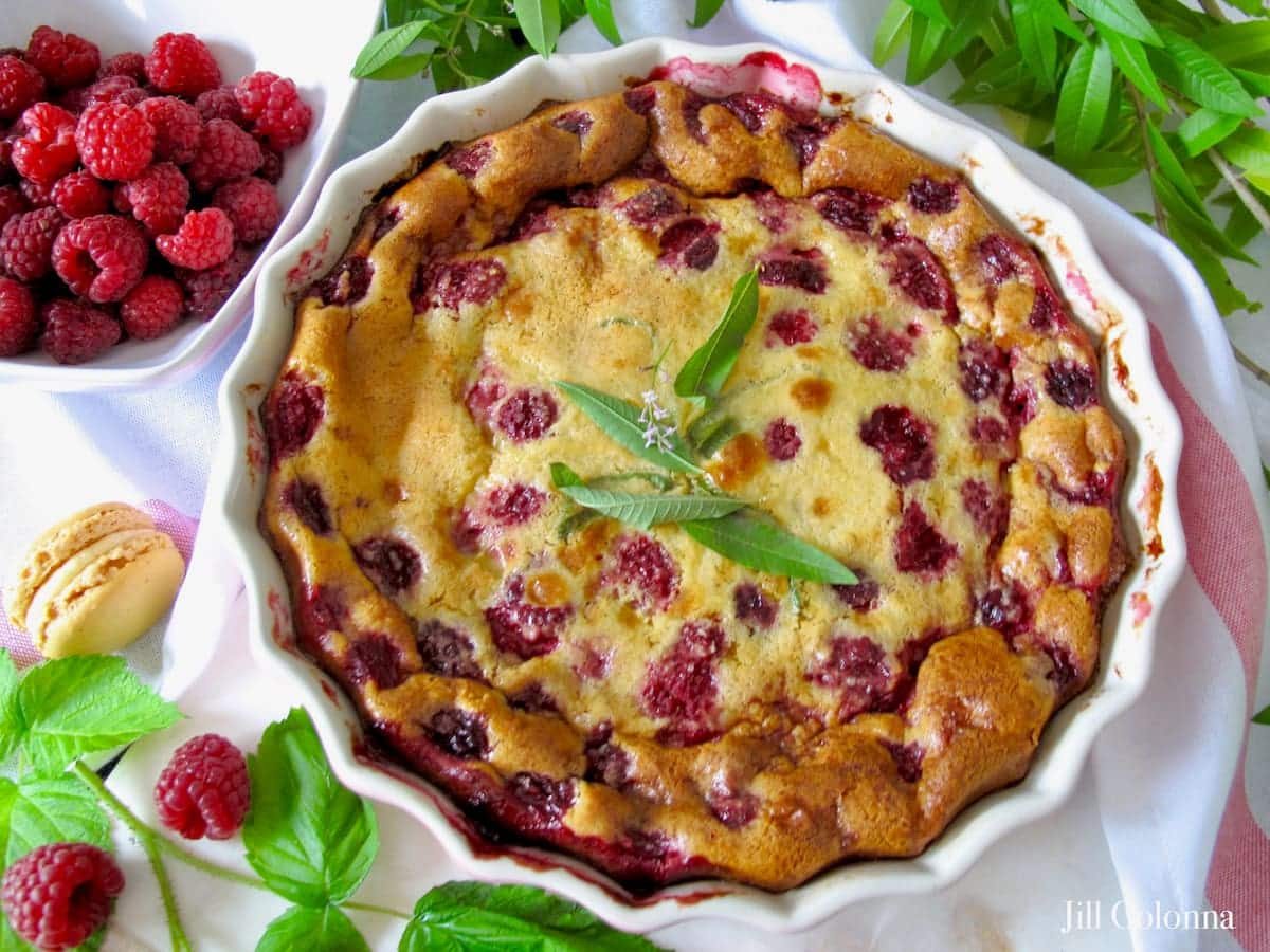 baked custard with raspberries in a French clafoutis dessert