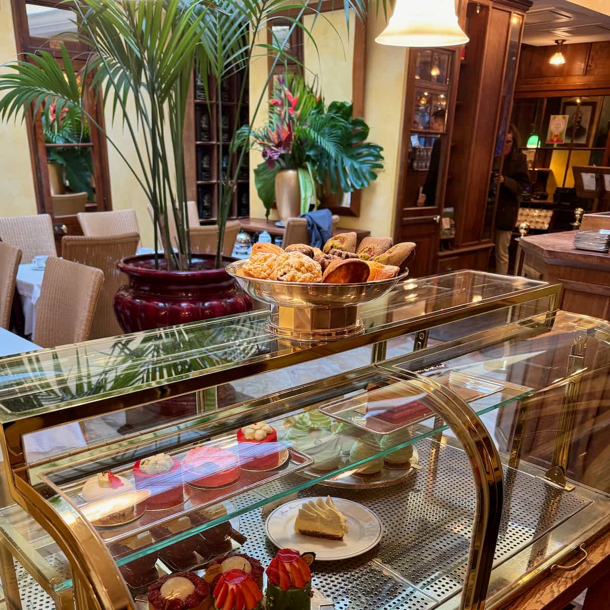 dessert trolley and cakes on the counter at Mariage Freres, the historical tea salon in Paris