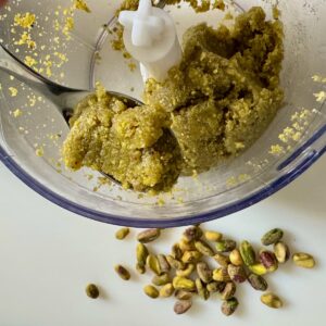 ground pistachios with water and vanilla to make a pistachio paste